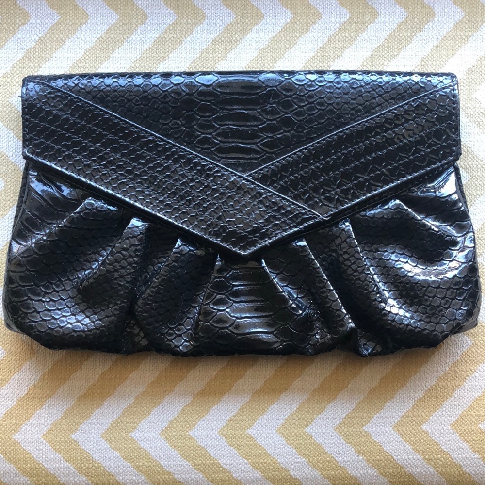 Black patent leather snakeskin clutch